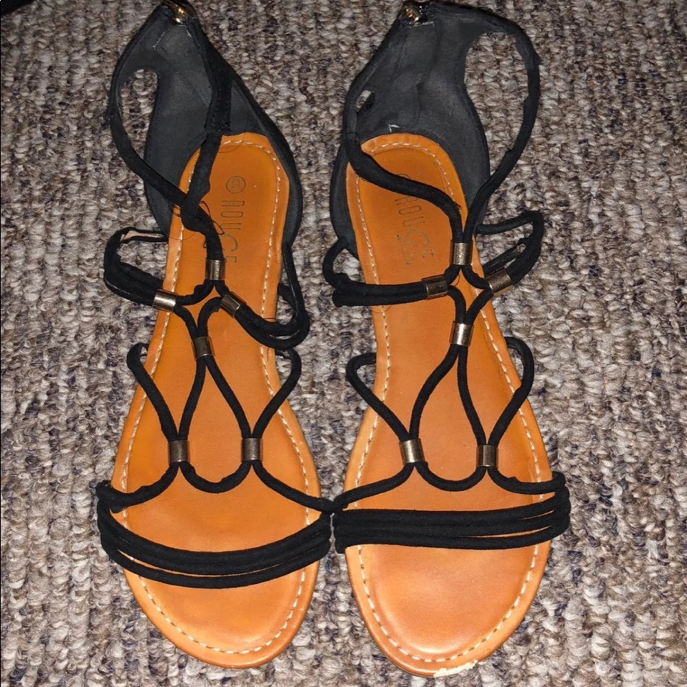 Black sandals with gold accents. Size 9